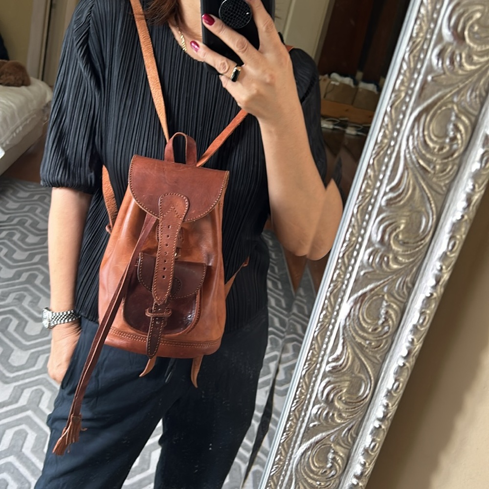 Vintage hand made brown leather backpack